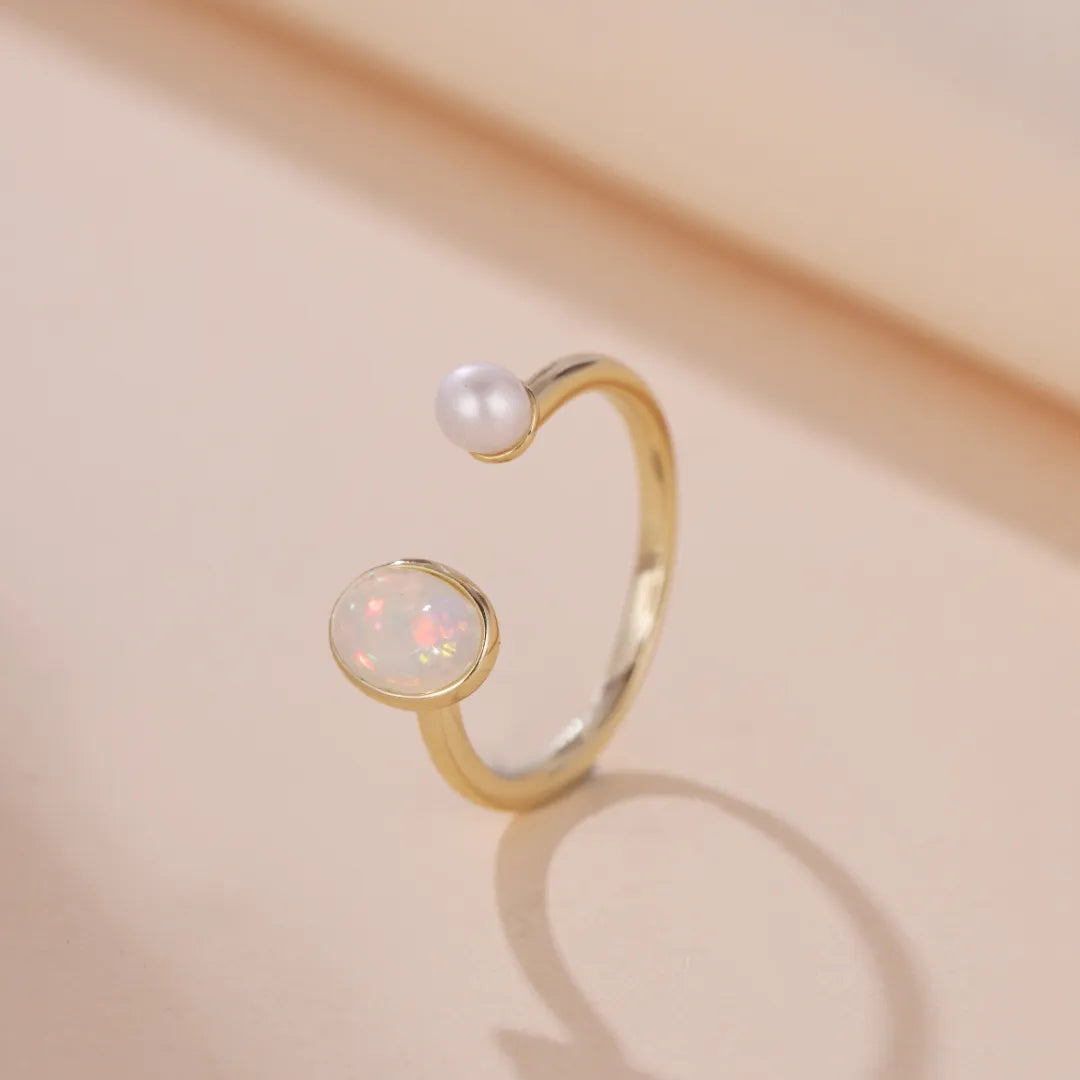 Opalring "Mystische Reflexionen" Goldsilber