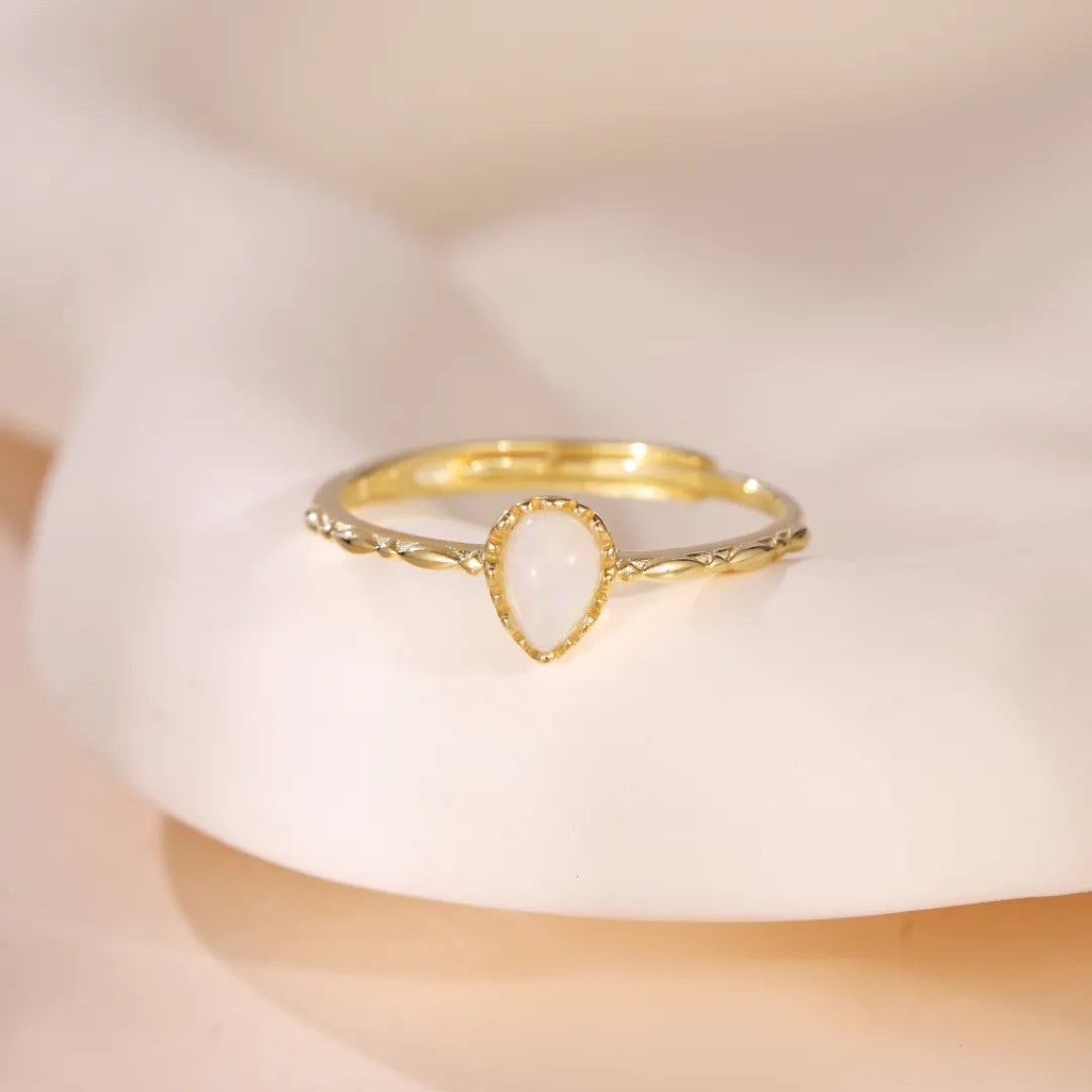 Opalring "Sanfte Tropfen" Goldsilber