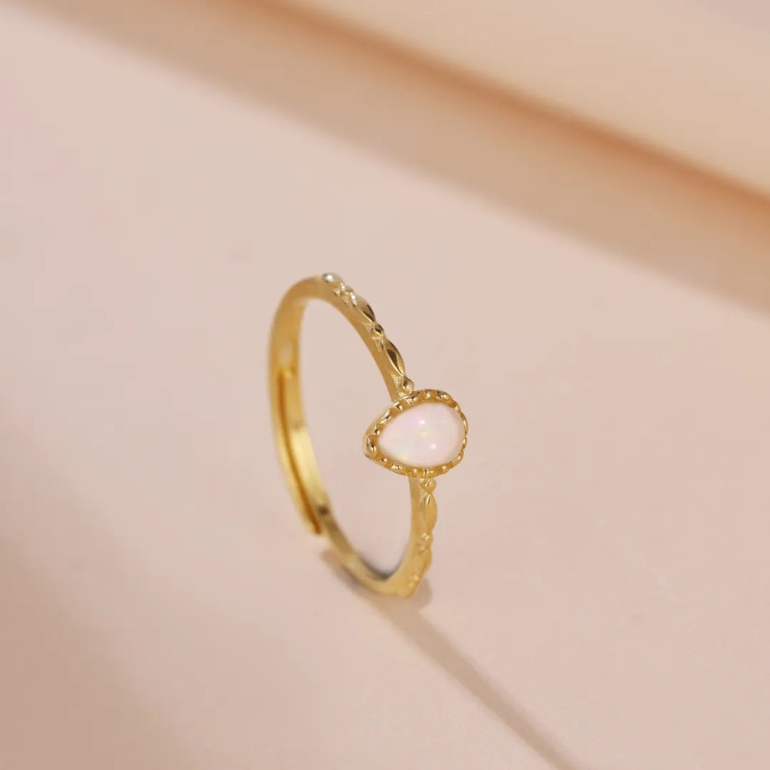 Opalring "Sanfte Tropfen" Goldsilber
