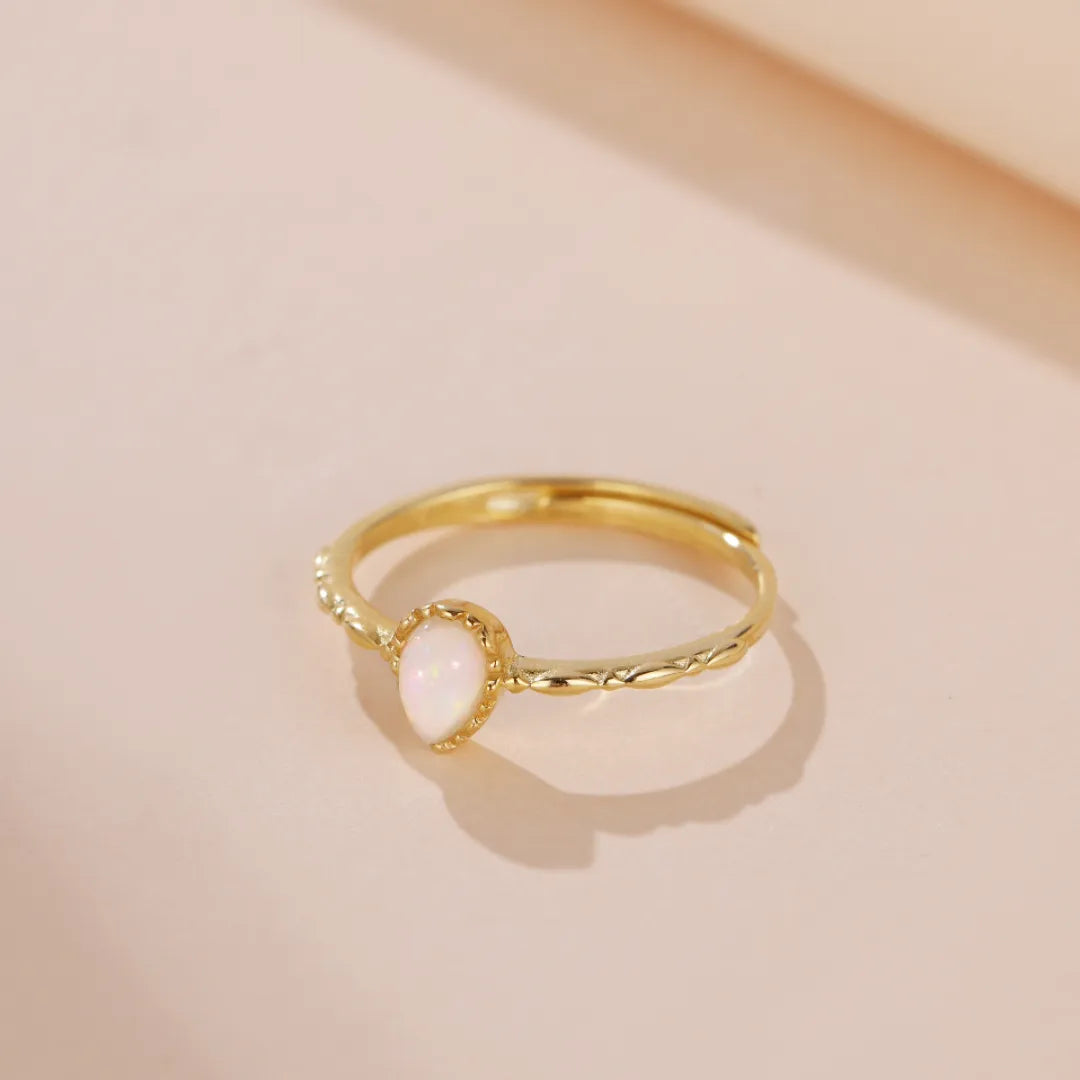 Opalring "Sanfte Tropfen" Goldsilber
