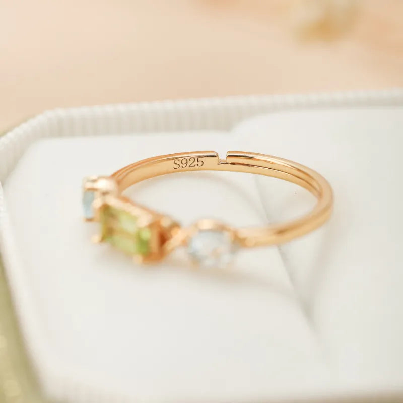 Peridot- und Topasring "Geometrische Raffinesse" vergoldetes Silber