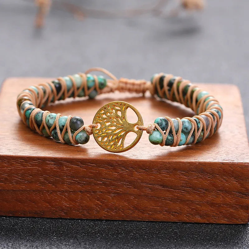 Bracelet Arbre de Vie en Jaspe Africain avec un pendentif doré "Racines de Bonheur" et perles bleues et vertes.