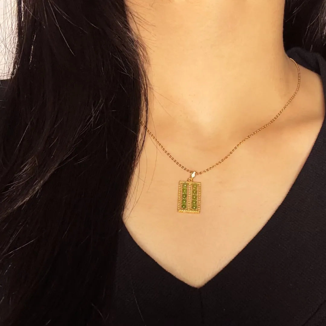 Jade Halskette "Ahnenweisheit" Gold Silber