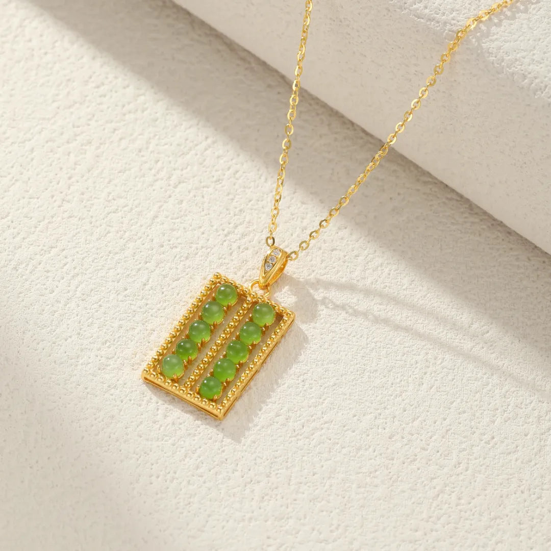 Jade Halskette "Ahnenweisheit" Gold Silber