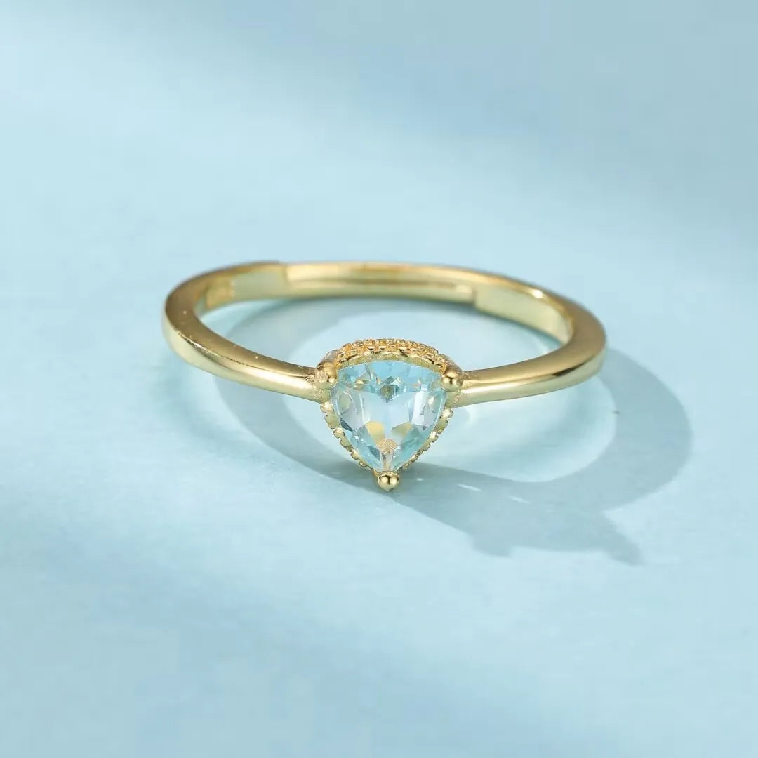 Anello Topazio "Chiarezza Celeste" Argento Dorato Oro 18K