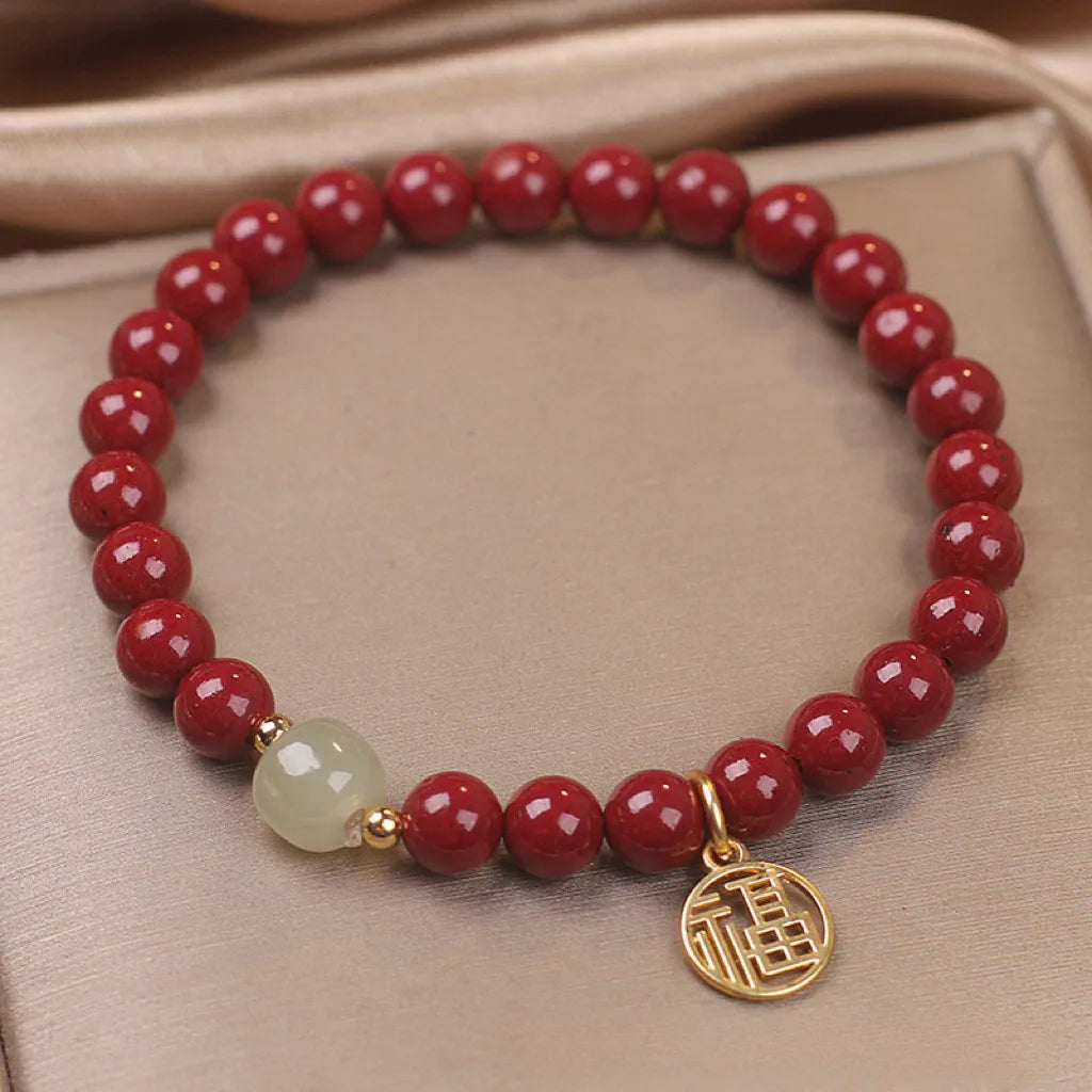 Cinnabar and Jade "Courage" Gold-Plated Silver Bracelet