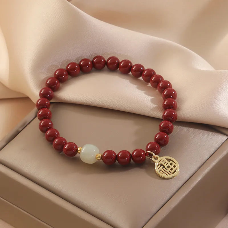 Cinnabar and Jade "Courage" Gold-Plated Silver Bracelet