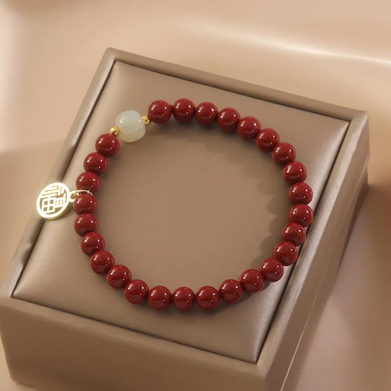 Cinnabar and Jade "Courage" Gold-Plated Silver Bracelet