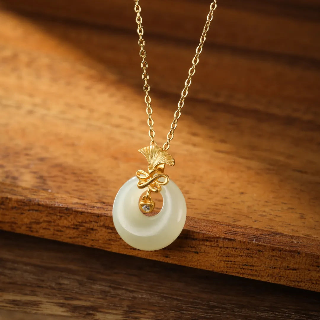 Ginkgo White Jade Necklace "Dance of Eternity" Gold-Plated Silver